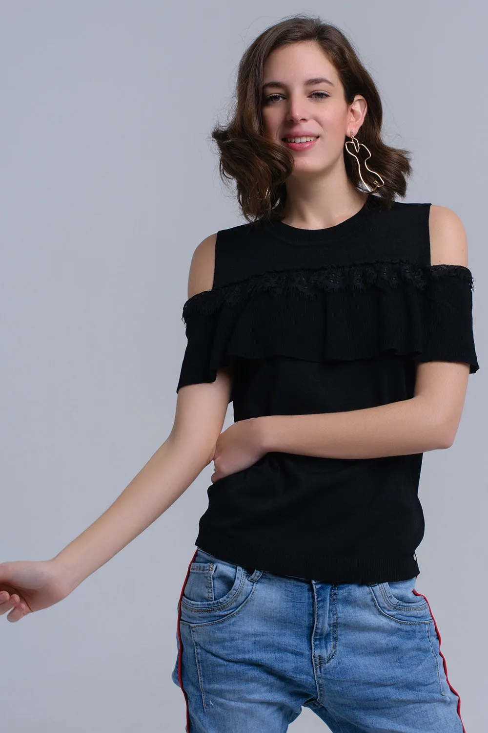 Black cold shoulder sweater with ruffle and lace
