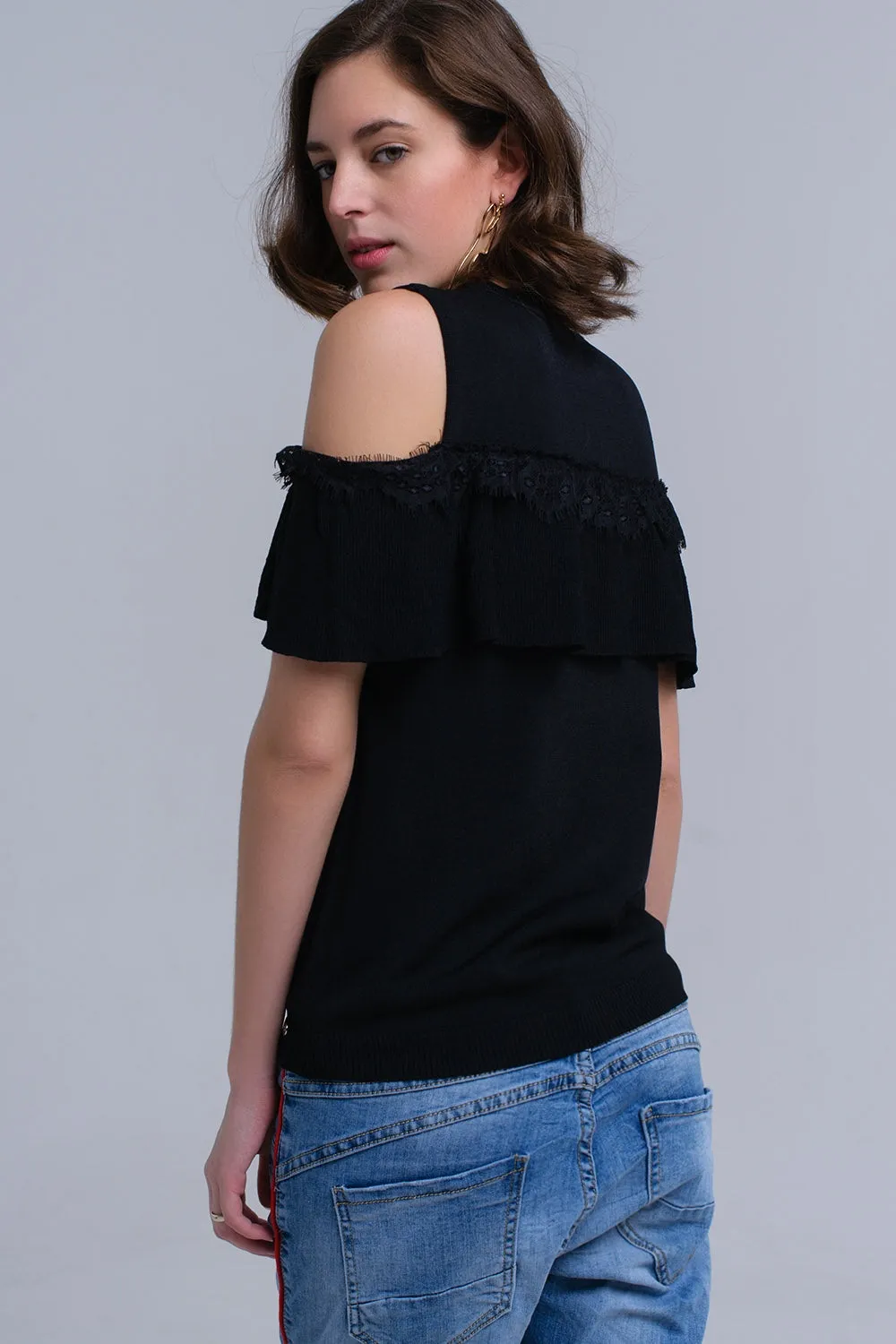 Black cold shoulder sweater with ruffle and lace